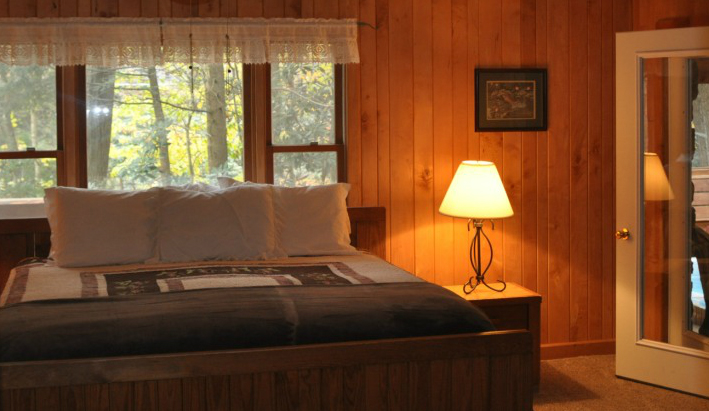 Laurel Place Bedroom with Wood Panel Walls